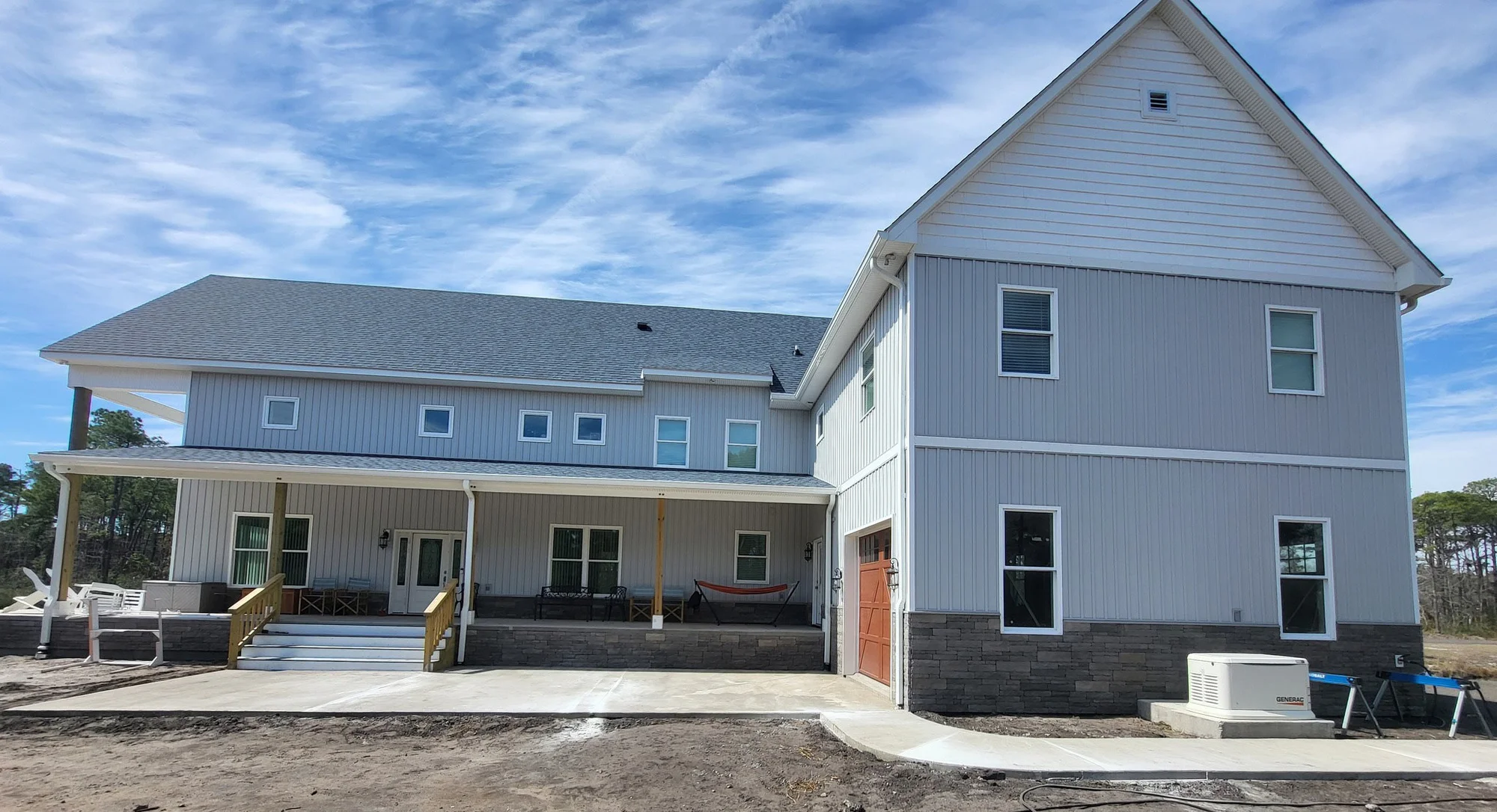 Concrete walk and patio around a new home